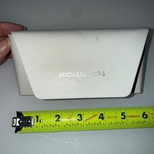 Michael Kors White leather eyeglass holder with a minimalist design